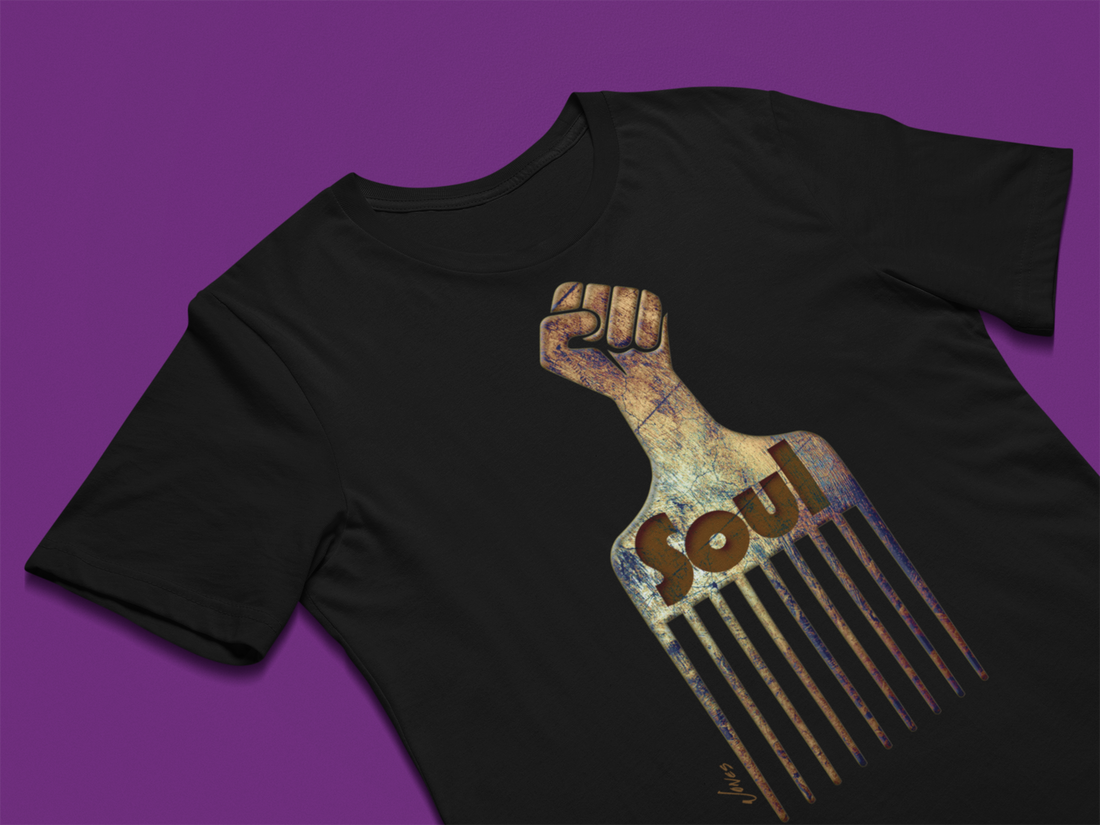 Retro Soul Afro Pick T-Shirt – A 100% cotton tee featuring a distinctive strong fist graphic handle, combining retro vibes with modern style for a powerful and empowering fashion statement